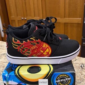 Heelys Black Sneakers with Red Flame Design